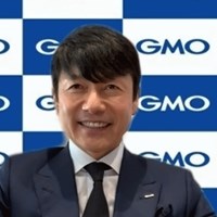 オンラインで取材に応じたGMOの熊谷正寿会長兼社長（Zoomの画面をキャプチャー） 2021年 熊谷正寿