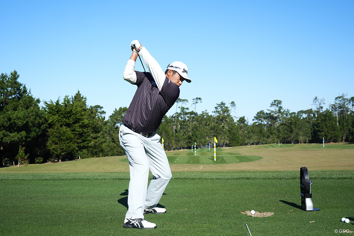 スイングのトップ