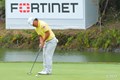 Holes the winning putt !